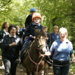 Photo of rider enjoying walk on pony
